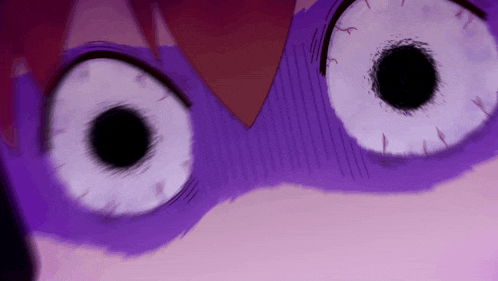 a close up of a person 's face with a purple mask on
