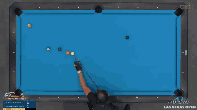 a pool table with a diamond las vegas open advertisement