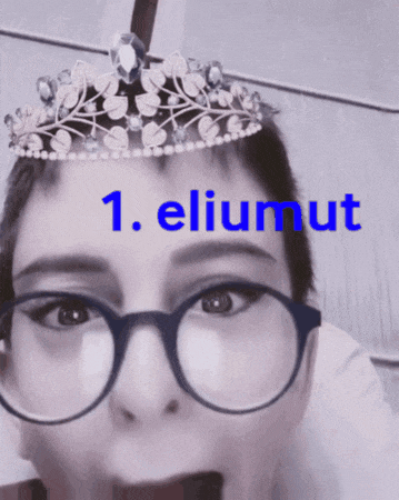 a woman wearing glasses and a tiara has the word eliumut written on her face