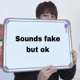 a person holding a sign that says " sounds fake but ok "