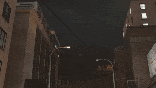 a computer generated image of a building on fire with a man laying on the ground in the foreground