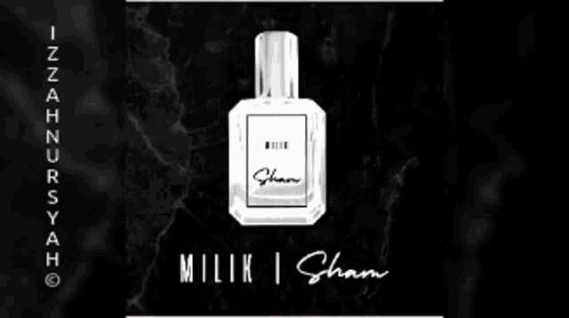 a man wearing sunglasses and a suit is standing next to a bottle of sham perfume