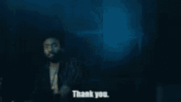 a man says " thanks you 're awesome " while talking on a phone