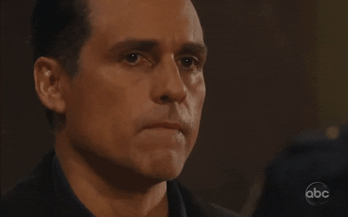 a close up of a man 's face with the abc logo on the bottom right