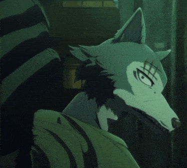 a close up of a wolf 's face with a few lines on it