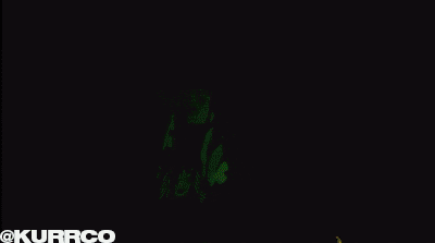 a man is smoking a cigarette in a dark room with fire behind him and the hashtag @kurrco