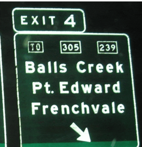 a sign that says exit 4 to 305 and 239