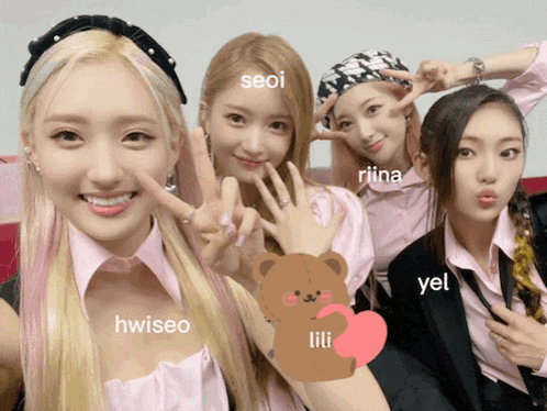 a group of girls posing for a picture with the names seoi riina hwiseo and yel