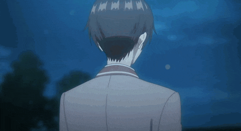 the back of a man 's head is shown in a blurry photo