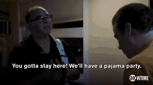 two men are talking and one of them says " you gotta stay here "