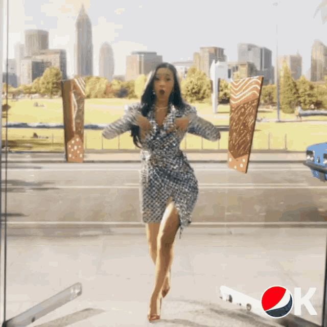 a pepsi ad with a woman in a dress holding ice cream cones