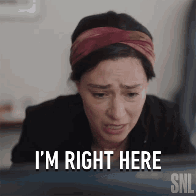 a woman says i 'm right here in front of a computer