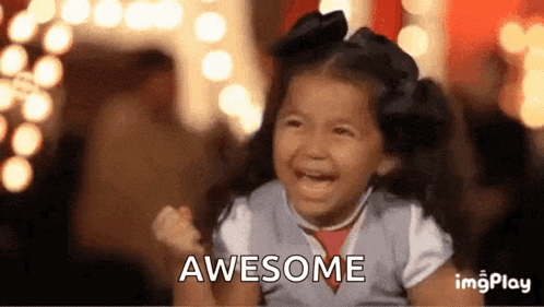 a little girl is crying and holding her fist up with the words awesome behind her .
