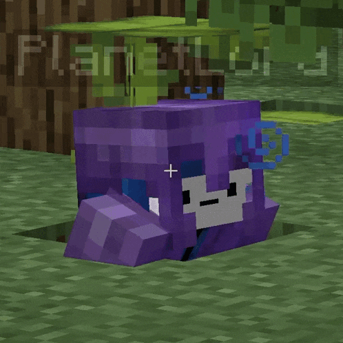 a purple block with a white face is in a minecraft scene