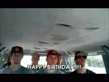 a group of baseball players in a van saying happy birthday !!!