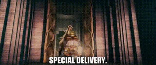 a woman is standing in front of a window with the words `` special delivery '' written on the bottom .