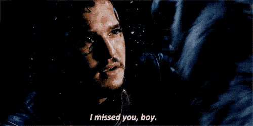 a man is talking to a wolf in the dark and saying `` i missed you , boy '' .