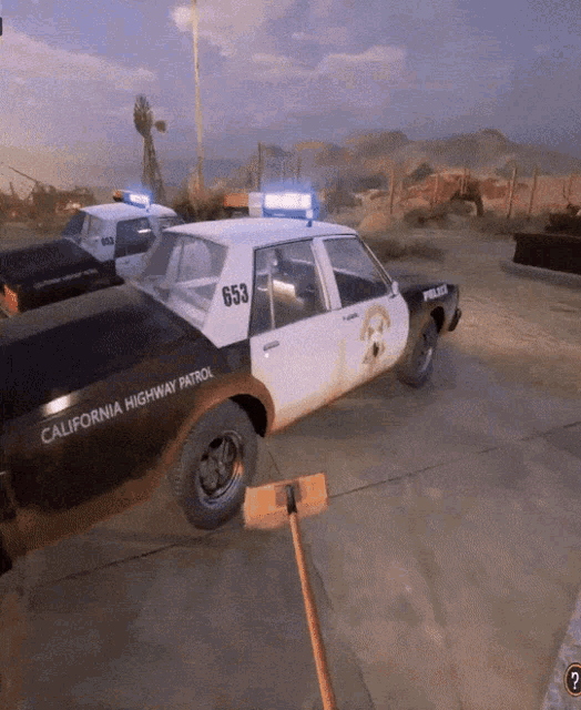 a black and white california highway patrol car