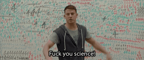 a man is standing in front of a wall with numbers on it and says fuck you science