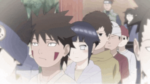 a group of anime characters are standing in a row .