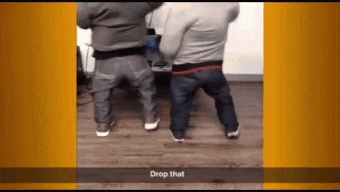 a video of two men dancing with the words drop that on the bottom