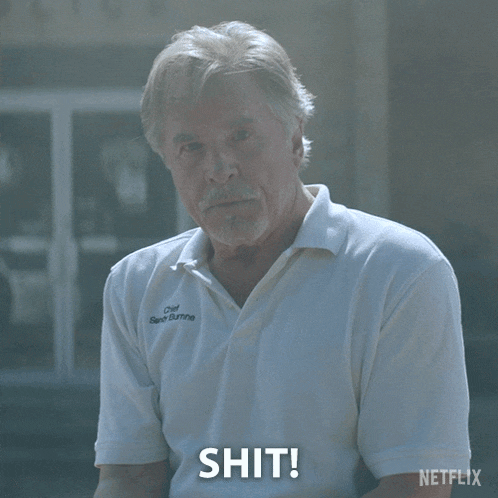 a man in a white shirt says shit in front of a netflix sign