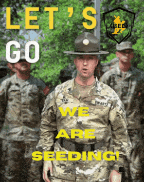 a man in a military uniform stands in front of a group of soldiers and says let 's go we are seeding