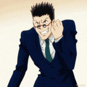 a man in a suit and tie is making a face