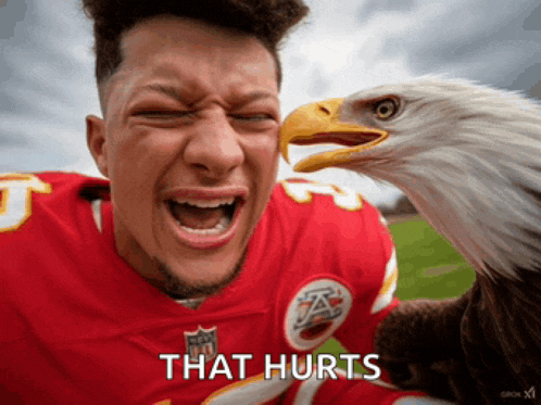 a football player with a bald eagle behind him and the words that hurts below him
