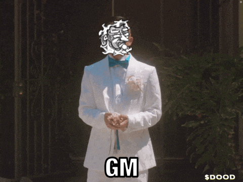 a man in a tuxedo with gm written on the bottom