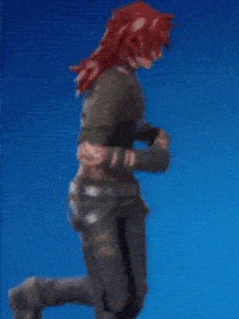 a blurry picture of a woman holding a gun in front of a blue background