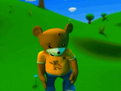 a teddy bear wearing a yellow shirt with a picture of a bear on it