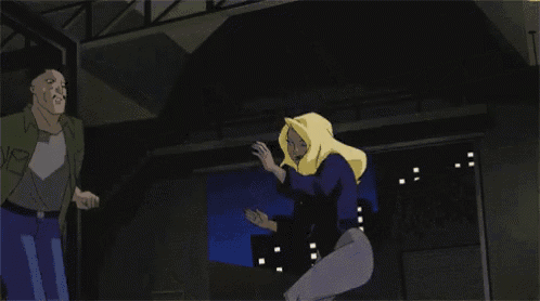a woman with blonde hair is being held by a man