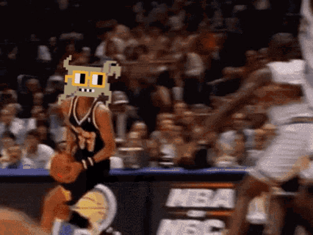 a basketball player wearing a mask with a cartoon face on it