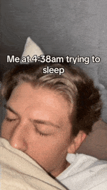 a man laying in bed with his eyes closed and a caption that says " me at 4:38am trying to sleep "