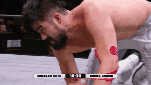 a wrestling match between wheeler yuta and daniel garcia is underway