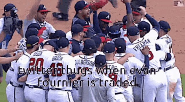 a group of baseball players huddle together with the words twitter hugs when evan fournier is traded in the corner