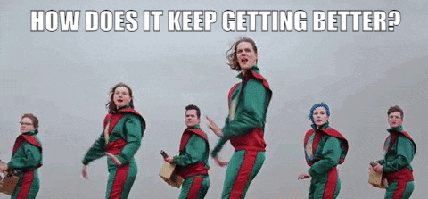 a group of people in green and red jumpsuits are standing in a line with the words " how does it keep getting better " above them