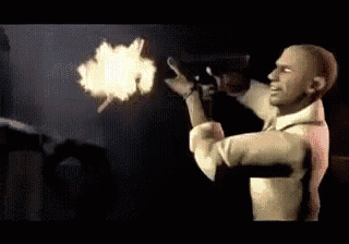 a man in a white shirt is holding a gun with a bullet coming out of it