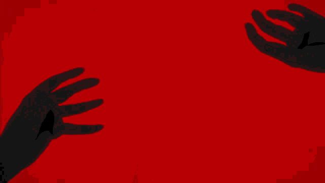 a hand is holding a bloody knife with a red background