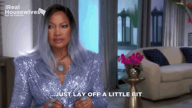 a woman says just lay off a little bit in a living room