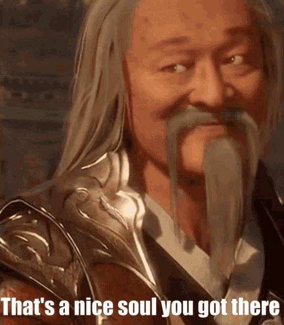 a man with long hair and a beard has the words that 's a nice soul you got there on his face