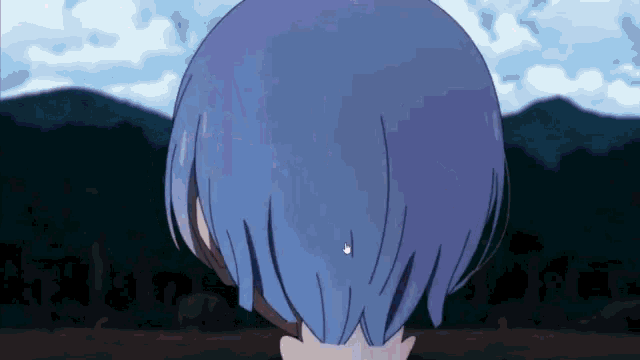a close up of a person 's head with blue hair