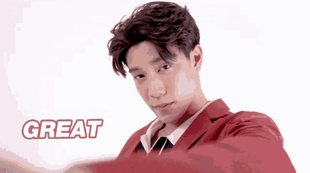 a young man in a red jacket and tie with the word great above him