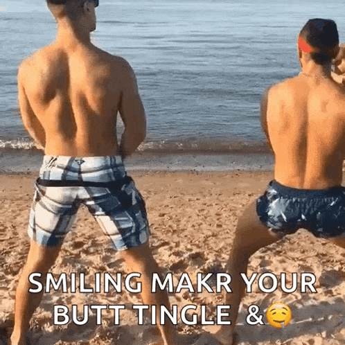 two shirtless men are dancing on a beach with the caption smiling makr your butt tingle &