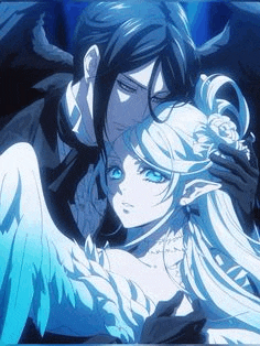 a man and a woman are standing next to each other in a dark room .