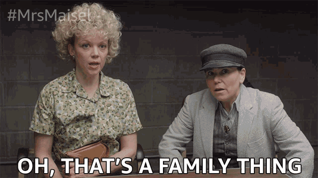 two women sit at a table with the words oh that 's a family thing