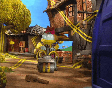 a cartoon character wearing a yellow cape and a red hat rides a roller coaster