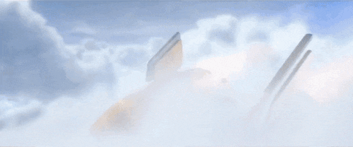 a close up of a rocket flying through the air .
