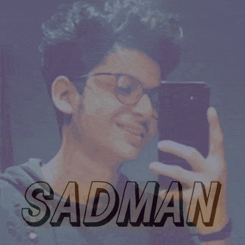 a young man taking a picture of himself with the name sadman below him